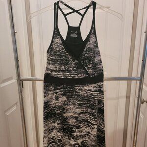 Exertek comfortable, soft black & white dress.  Polyester & spandex.